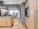 Well-equipped kitchen with stainless steel appliances, an island, and hardwood flooring at 1449 Wynkoop St # 305, Denver, CO 80202