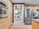 Modern kitchen offers stainless steel appliances and easy access to laundry area at 1449 Wynkoop St # 305, Denver, CO 80202