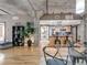 Open living area, with sightlines to the kitchen and laundry areas at 1449 Wynkoop St # 305, Denver, CO 80202