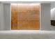 Lobby entrance featuring copper panels with 