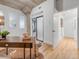 Home office boasts natural light, modern finishes, and easy access to a full bathroom at 1449 Wynkoop St # 305, Denver, CO 80202