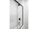 Modern bathroom featuring white subway tile and sleek black fixtures at 3483 S Race St, Englewood, CO 80113