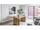 A home office featuring a stylish rug, desk, and a grey chair at 3483 S Race St, Englewood, CO 80113