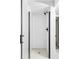Newly renovated walk-in shower with stylish subway tile and modern hardware at 3483 S Race St, Englewood, CO 80113