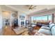 Inviting living room features a fireplace, hardwood floors, and comfortable seating at 20249 Terrace View Dr, Parker, CO 80134