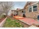 Backyard showcasing patio, lush lawn, and stone accents, great for relaxation and entertaining at 21270 E Eldorado Dr, Aurora, CO 80013