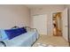 This bedroom features a light fixture, window and a comfortable bed at 21270 E Eldorado Dr, Aurora, CO 80013