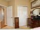 Charming bedroom features neutral walls, carpet, and a closet with sliding doors at 21270 E Eldorado Dr, Aurora, CO 80013