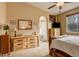This is the main bedroom with an ensuite bathroom and rustic wood furnishings at 21270 E Eldorado Dr, Aurora, CO 80013