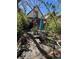 Private backyard patio with a round metal table and chair set, perfect for outdoor dining and relaxation at 231 W Ellsworth Ave, Denver, CO 80223