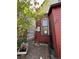 Enclosed backyard featuring a brick patio, and a private gated area for outdoor relaxation at 231 W Ellsworth Ave, Denver, CO 80223