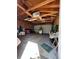Spacious garage with overhead door and visible ceiling beams offers ample storage and workspace at 231 W Ellsworth Ave, Denver, CO 80223