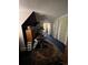 Hallway featuring blue carpet, white closet doors, and an exercise machine at 231 W Ellsworth Ave, Denver, CO 80223