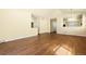 Spacious living room featuring hardwood floors and an open layout at 9814 Norfolk St, Commerce City, CO 80022
