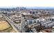Desirable aerial view of an apartment building in an urban neighborhood near shopping and traffic at 2899 N Speer Blvd # 203, Denver, CO 80211