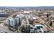 Aerial view of apartment building in a city neighborhood with a baseball diamond nearby at 2899 N Speer Blvd # 203, Denver, CO 80211