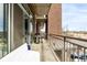 Spacious balcony with gas grill, seating, city views and close to neighborhood amenities at 2899 N Speer Blvd # 203, Denver, CO 80211