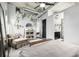 Spacious bedroom with modern decor, industrial ceiling, and an attached bathroom, showcasing comfort and style at 2899 N Speer Blvd # 203, Denver, CO 80211