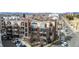 A street view displays the building's architecture and balconies, enhancing its neighborhood appeal at 2899 N Speer Blvd # 203, Denver, CO 80211
