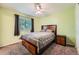 Comfortable bedroom with neutral carpet, ample lighting, and a window with privacy blinds at 10089 Wynwood Way, Highlands Ranch, CO 80126