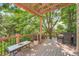 Inviting outdoor deck with a pergola, seating area, and lush greenery, perfect for entertaining at 10089 Wynwood Way, Highlands Ranch, CO 80126