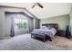 Spacious main bedroom features vaulted ceilings and a large window for ample natural light at 10089 Wynwood Way, Highlands Ranch, CO 80126