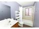 Relaxing bathroom featuring a tub with shower, tiled surround, and a classic vanity at 1775 S Memphis St, Aurora, CO 80017