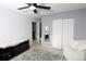 Comfortable bedroom with a ceiling fan, closet, and soft carpet for a cozy feel at 1775 S Memphis St, Aurora, CO 80017