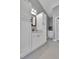 Bright bathroom with white vanities, drawers, and mirrors at 171 Columbine St, Larkspur, CO 80118