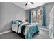 Inviting bedroom featuring a comfy bed and bright window at 171 Columbine St, Larkspur, CO 80118