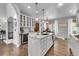 Stylish kitchen features a large island, granite countertops, and modern appliances with elegant accents at 171 Columbine St, Larkspur, CO 80118