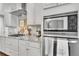 Close up of a kitchen showcasing stainless steel appliances and countertops at 171 Columbine St, Larkspur, CO 80118