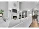 Inviting living room with fireplace, modern decor and views to the dining room at 171 Columbine St, Larkspur, CO 80118