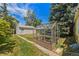 Backyard with a greenhouse and shed at 1665 S Madison St, Denver, CO 80210