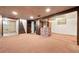 Basement with drop ceiling, bar and stairs at 1665 S Madison St, Denver, CO 80210