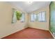 Bright bedroom with two windows bringing in natural light with scenic views at 1665 S Madison St, Denver, CO 80210