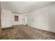 Spacious living room featuring a window allowing natural light to brighten the interior at 1665 S Madison St, Denver, CO 80210