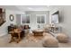 Basement living room with modern furniture and carpeted floors at 5511 Wabash St, Denver, CO 80238