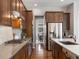 Modern kitchen featuring stainless steel appliances, granite countertops, and gas range at 5511 Wabash St, Denver, CO 80238