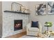 Charming living room with a modern fireplace, stylish decor, and comfortable seating at 5511 Wabash St, Denver, CO 80238