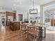 Open floor plan from dining area to living room at 5511 Wabash St, Denver, CO 80238