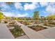 Picturesque park with lush landscaping, walkways, a playground, and newly planted trees in a Gathering-friendly community at 5511 Wabash St, Denver, CO 80238