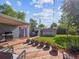 Inviting back deck with BBQ, flowers, and backyard views, perfect for relaxing and entertaining at 4112 S Galapago St, Englewood, CO 80110