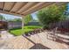 Charming backyard with a wooden deck and rows of flowering plants at 4112 S Galapago St, Englewood, CO 80110