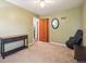 Room with light neutral walls, a mirror, and a doorway, creating a simple space at 4112 S Galapago St, Englewood, CO 80110