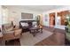 Cozy living room with dark wood floors, comfortable seating, and stylish decor at 4112 S Galapago St, Englewood, CO 80110