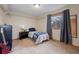 Cozy bedroom with a window and ample closet space at 3420 S Nucla Way, Aurora, CO 80013