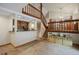 Spacious entryway with tile flooring and a view to the kitchen and loft at 3420 S Nucla Way, Aurora, CO 80013