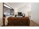 Living room with a leather couch, window seat, and a modern aesthetic at 3420 S Nucla Way, Aurora, CO 80013