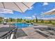 Outdoor perfection! This backyard has a built in pool with water feature, dining and lounge area, with gorgeous views at 2705 Fox View Trl, Franktown, CO 80116
